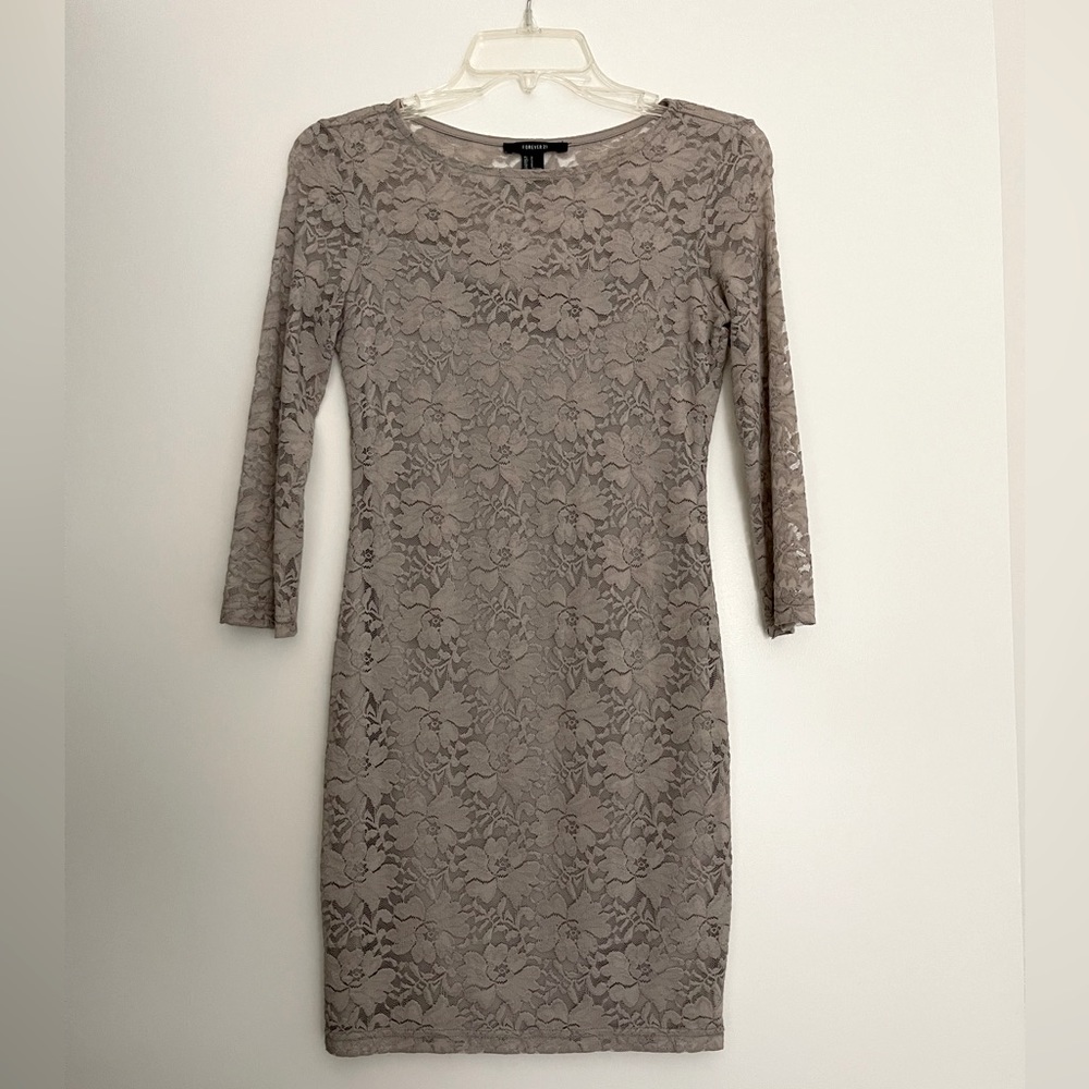 Lace dress . 3/4-sleeves. Size Small. Perfect for an elegant evening-worthy look